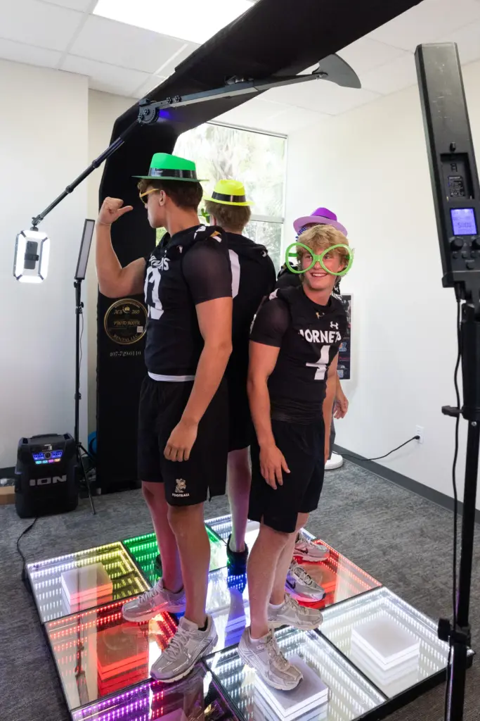 Players from Bishop Moore High School pose for a 360...