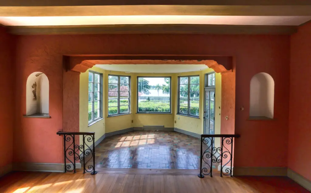 Several steps down from the formal dining room is a...
