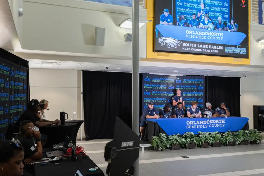 South Lake High School players answer questions during varsity media...