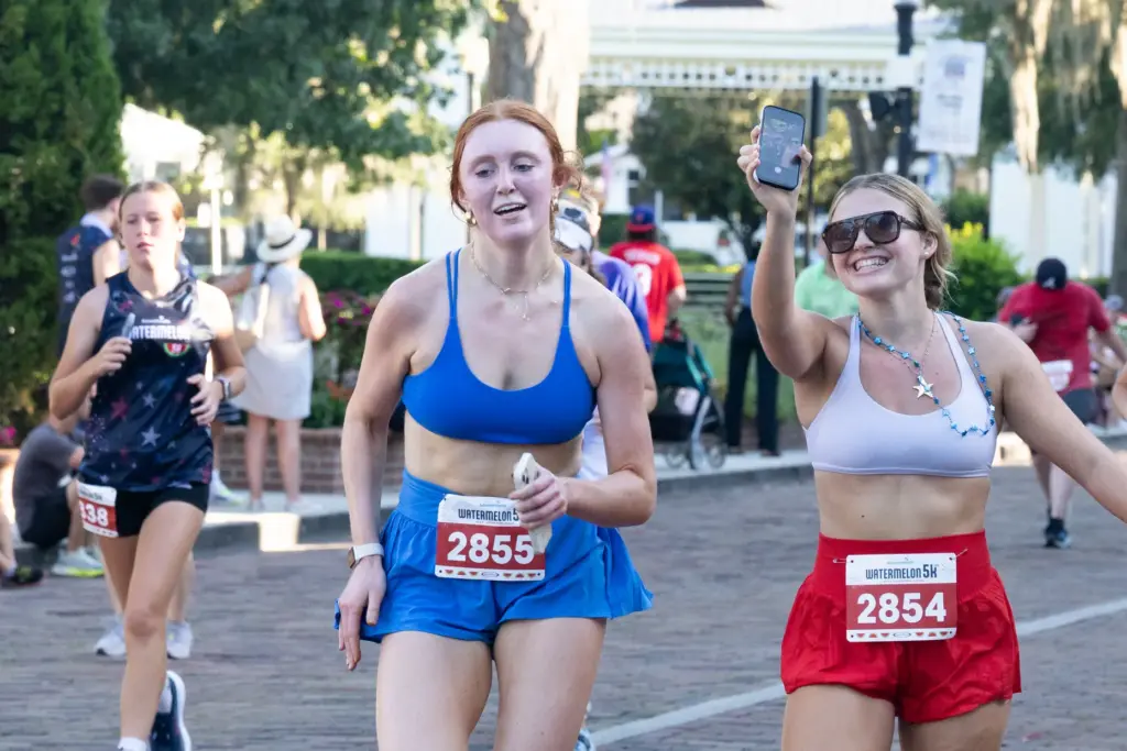 Runners take a photo as they reach the finish line...