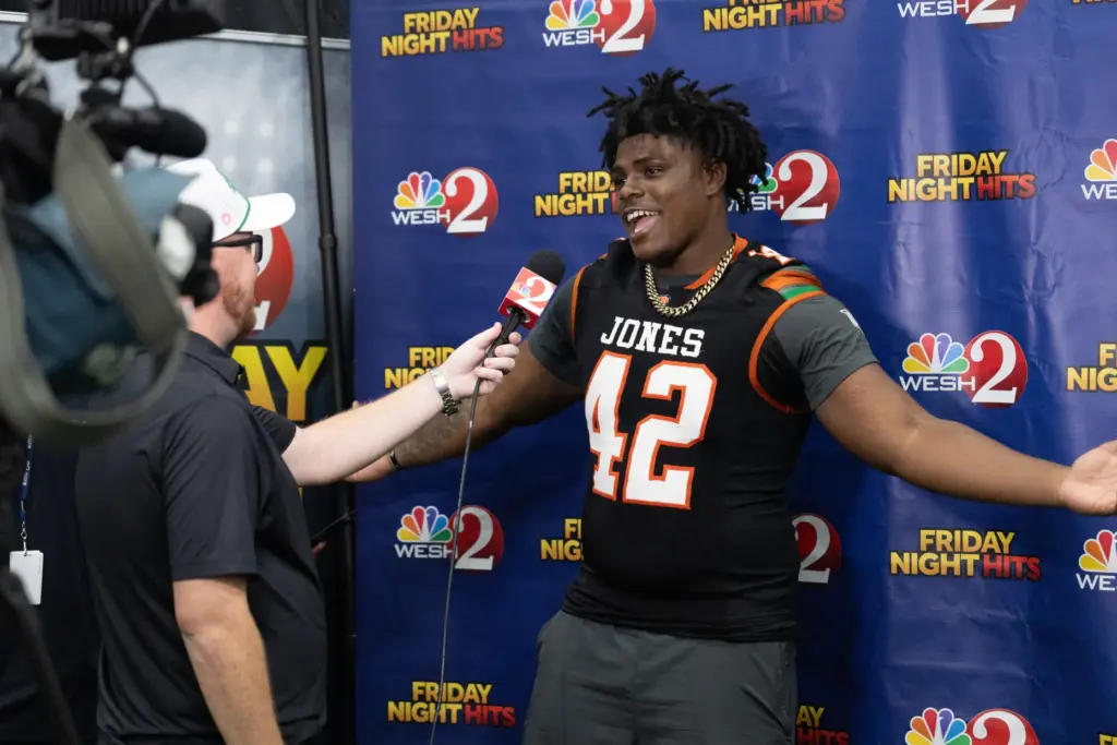 Player from Jones High School interviews with WESH2 during varsity...