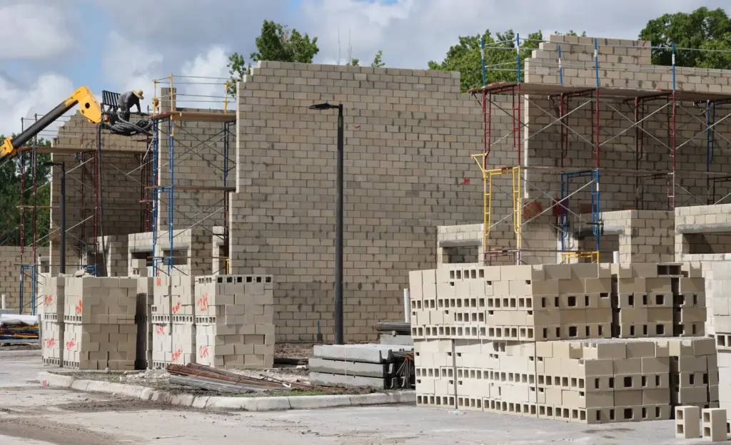 Sagewood Corporation took over as general contractor at Magic Village...