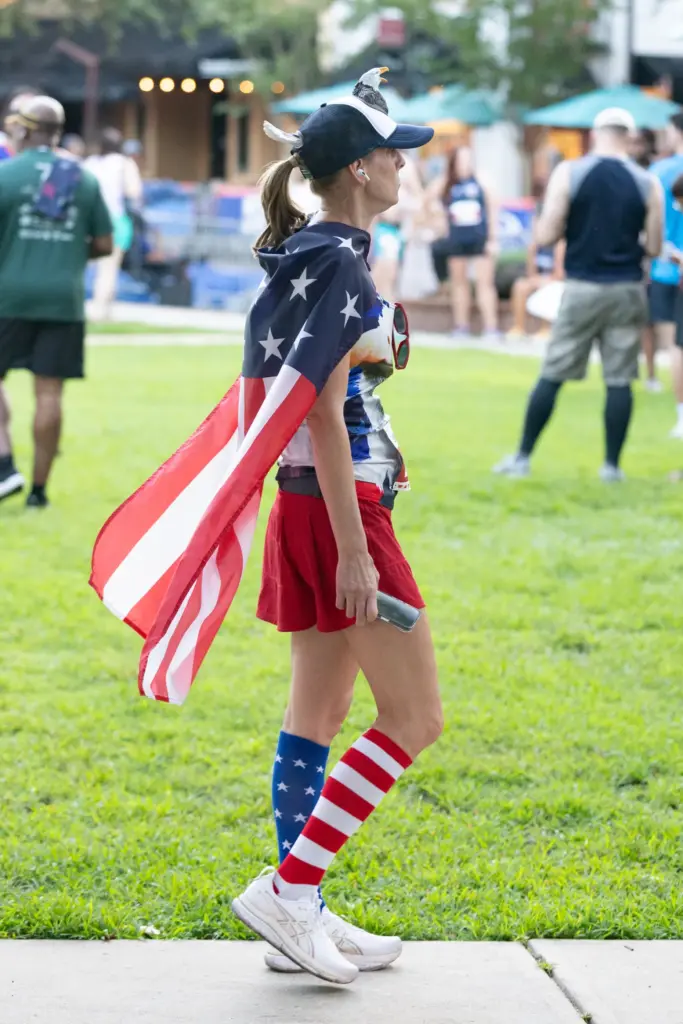 A runner with an American flag and bald eagle on...