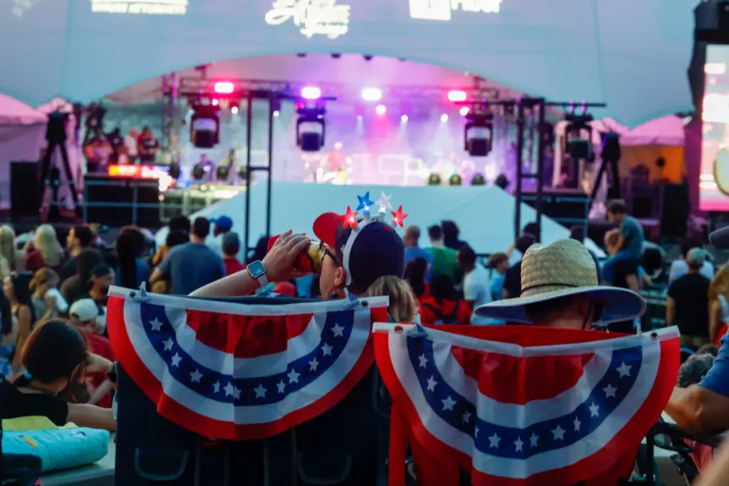 Red, Hot and Boom attendees listen to music before the...