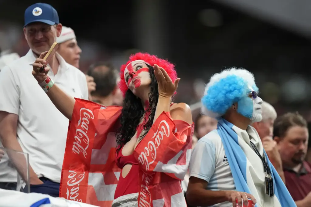 A fan takes a selfie before the World Cup semifinal...