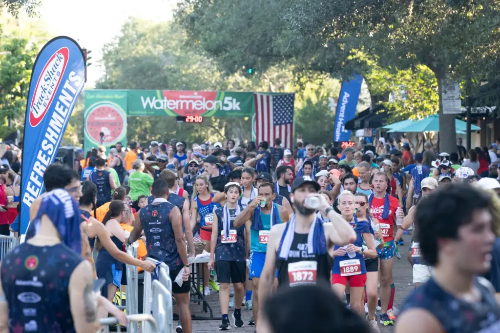 Runners fill Park Ave after finishing the Watermelon 5K at...