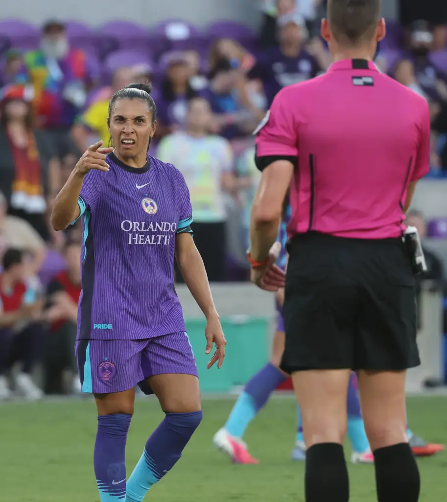 Orlando player Marta is displeased with a call as she...