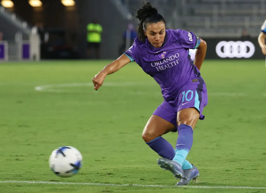 Orlando player Marta kicks at goal during the Chicago Stars...