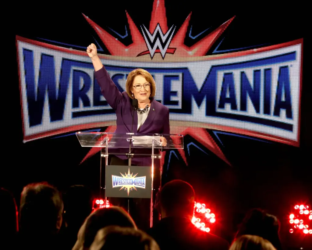 Orange County Mayor Teresa Jacobs cheers as World Wrestling Entertainment...