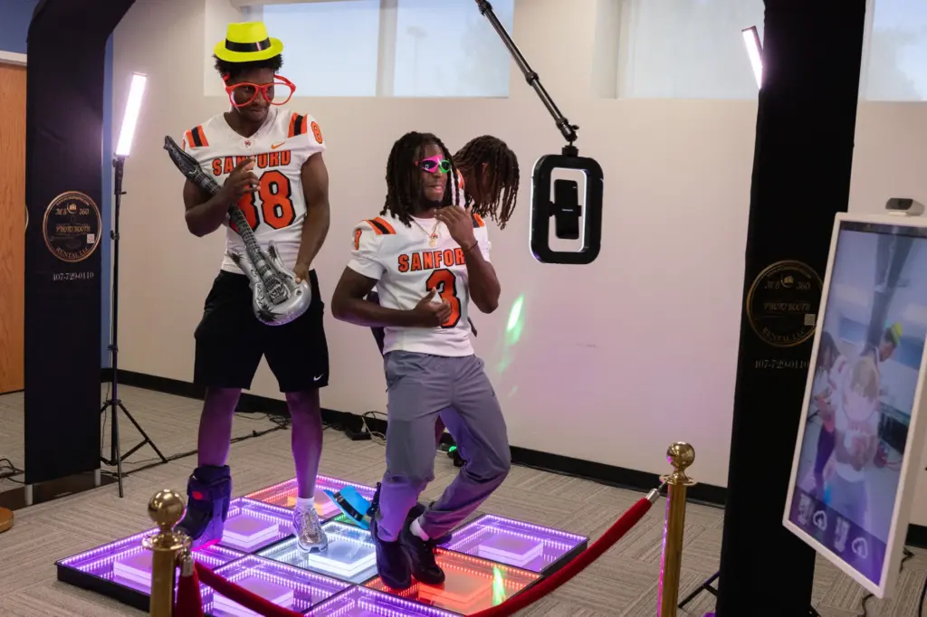 Players from Seminole High School dance for a 360 video...