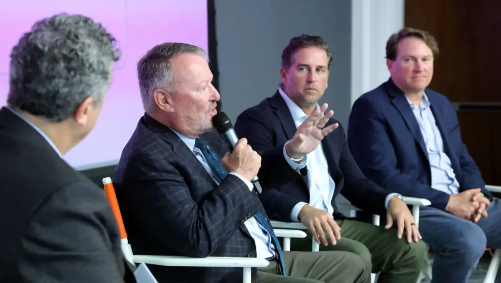 DISCUSSING DOWNTOWN â Orlando mayor Buddy Dyer answers a question...