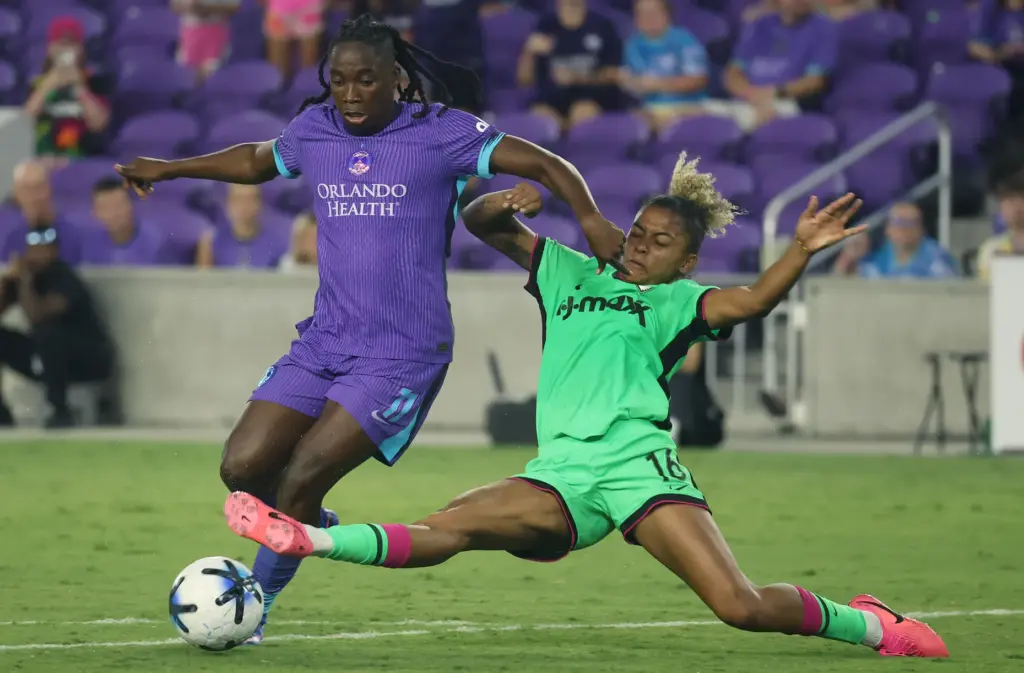 Orlando player Barbra Banda (11) keeps the ball away from...
