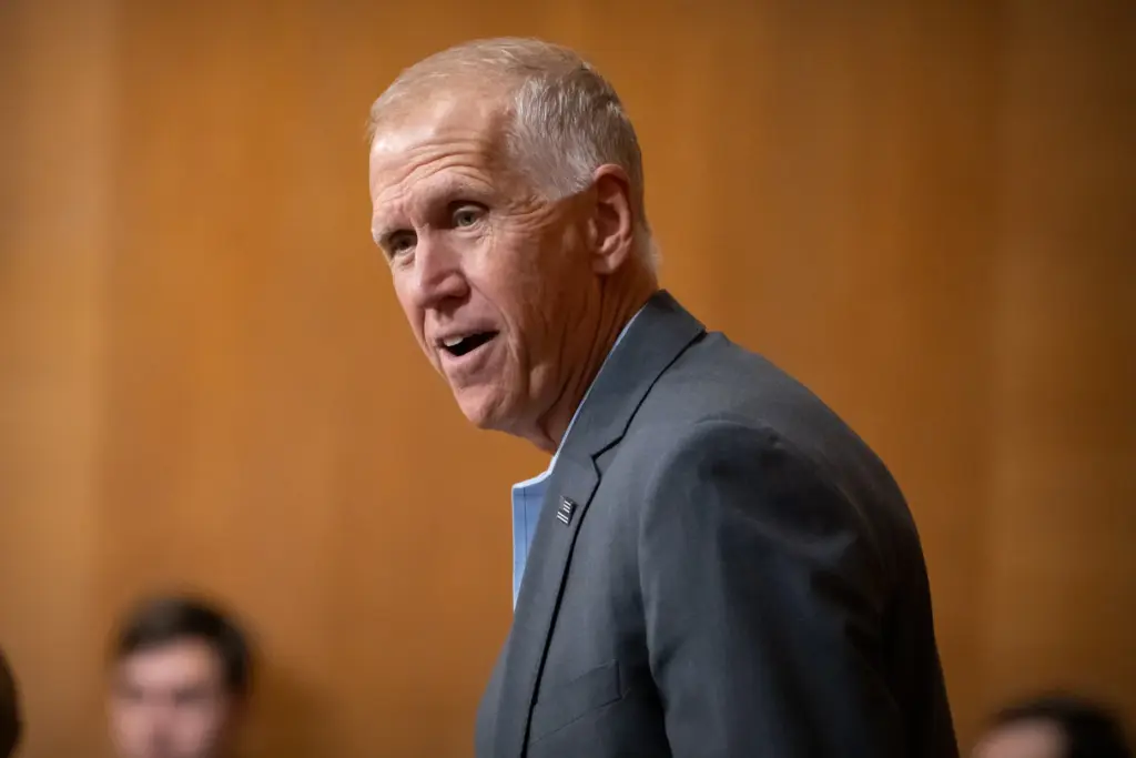 Sen. Thom Tillis, R-N.C., arrives for a hearing of the Senate Finance Committee.