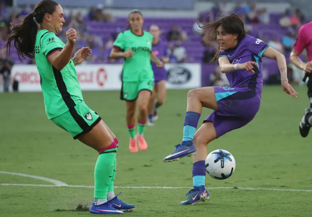 Orlando player Jacquie Ovalle (right) can't get the ball past...