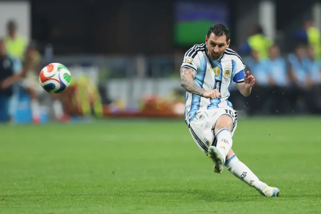 Argentina’s Lionel Messi takes a free kick during the World...