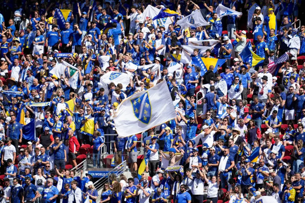 Bosnia fans cheer before the World Cup round of 32...