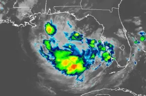 Slow-moving system off Florida coast could become tropical, hurricane center says