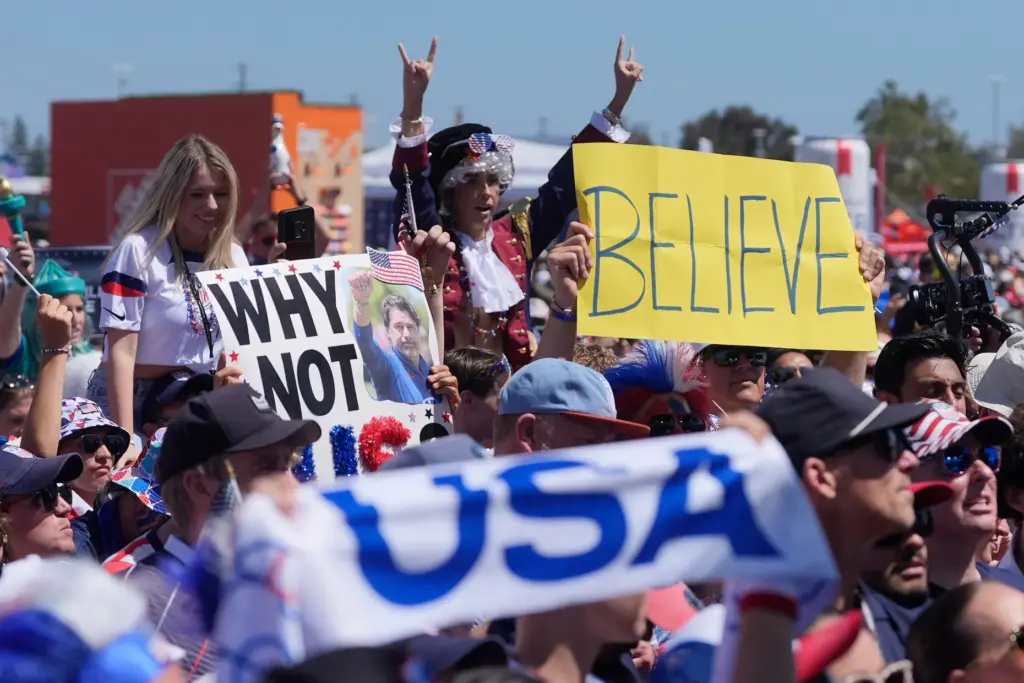 United States fans cheer outside the stadium before the World...