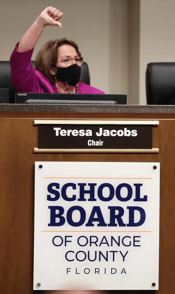 Orange County School Board Chair Teresa Jacobs gestures at the...