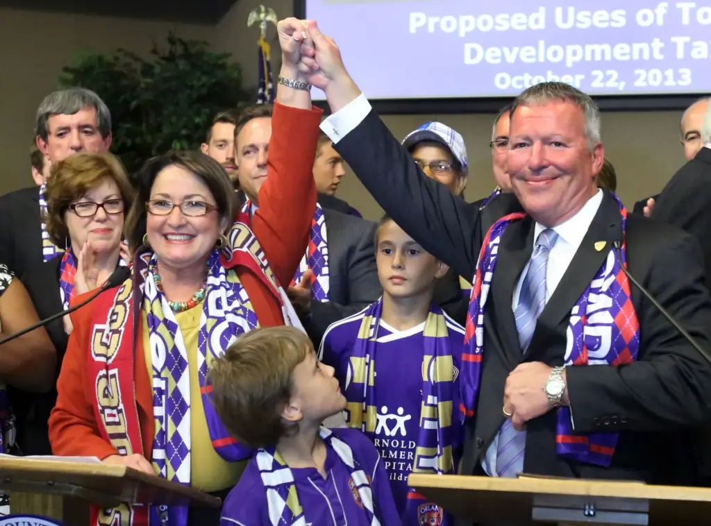 Orange County Mayor Teresa Jacobs ,left, and Mayor Buddy Dyer...