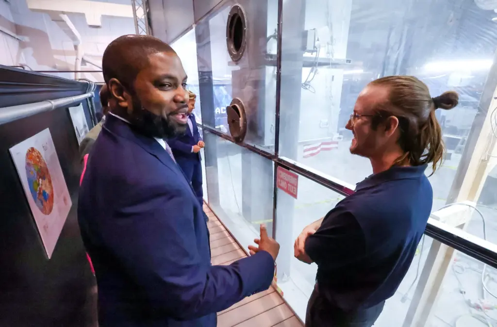Florida Republican gubernatorial candidate Byron Donalds chats with employee Max...