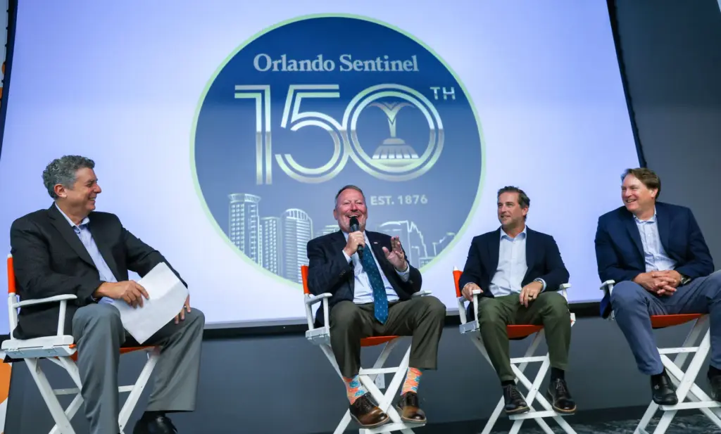 DISCUSSING DOWNTOWN â Orlando mayor Buddy Dyer answers a question...