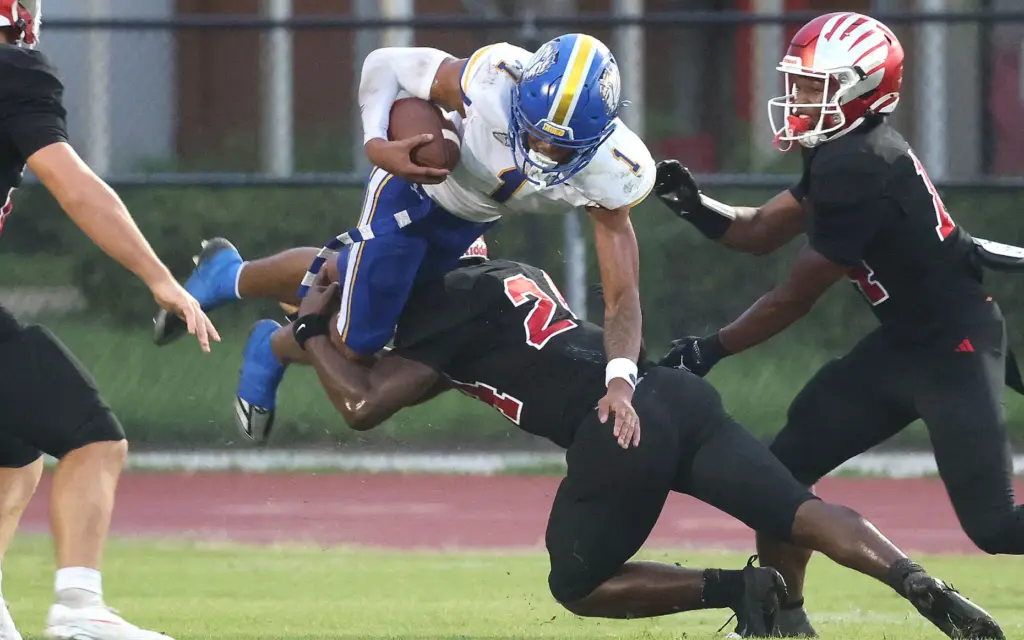 TFA receiver Jaiziah Battle (1) leaps after catching a pass...