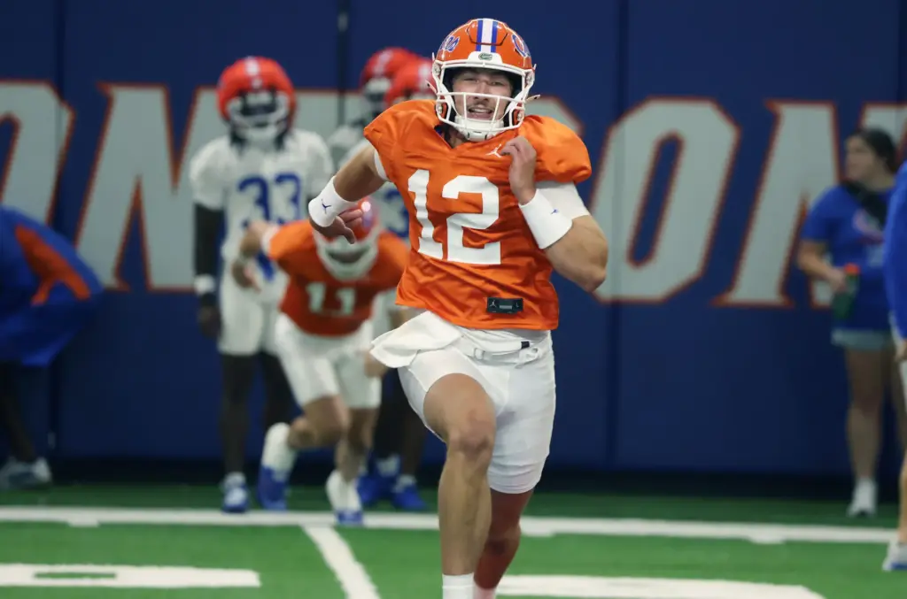 University of Florida quarterback Aaron Philo runs during the Gators...