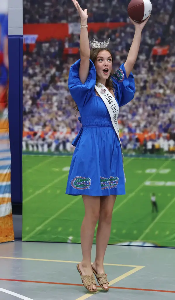 Miss University of Florida Maralee Thompson celebrates after catching a...