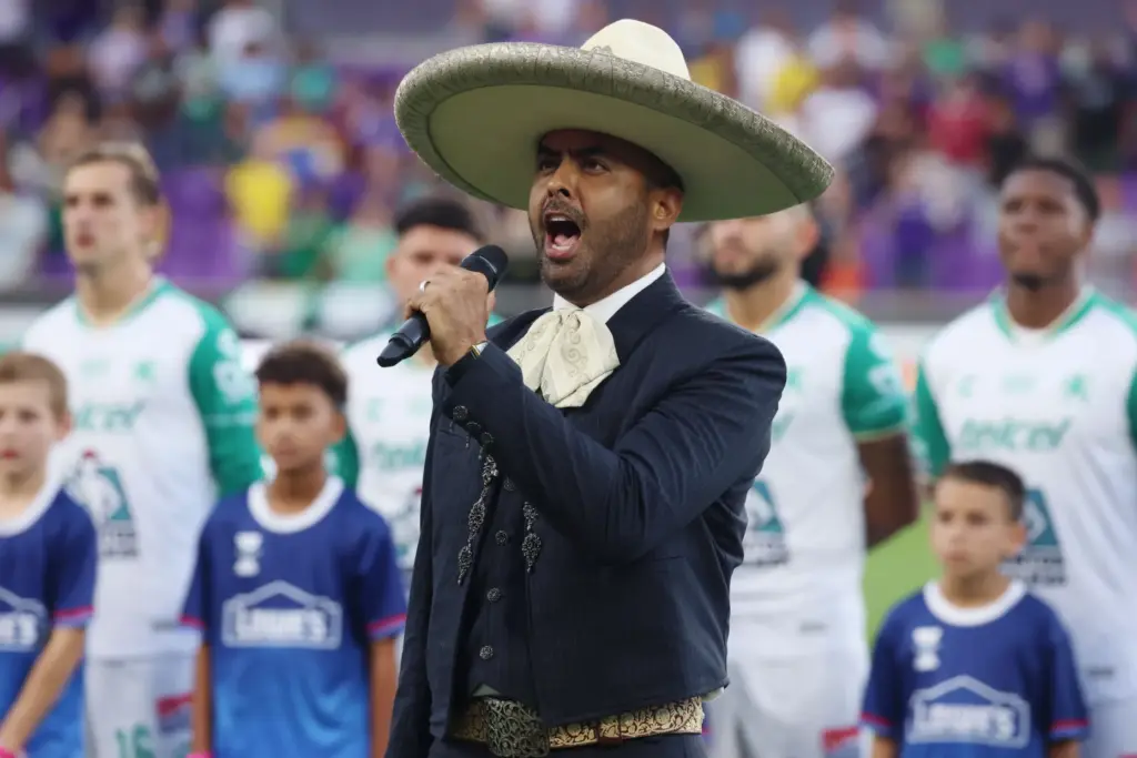 The Mexican national anthem is performed before the Club Leon...