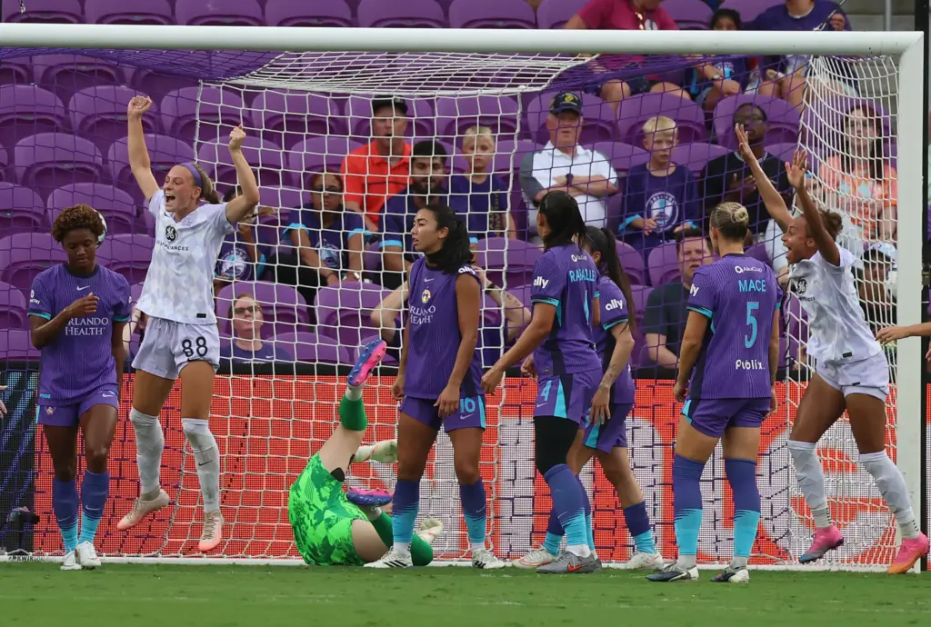 Louisville players celebrate after a goal during the Racing Louisville...