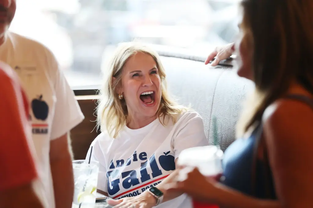 Angie Gallo enjoys herself with supporters during her election party...