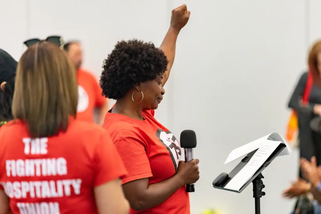 Local 737 Union member speaks in creole to the crowd...