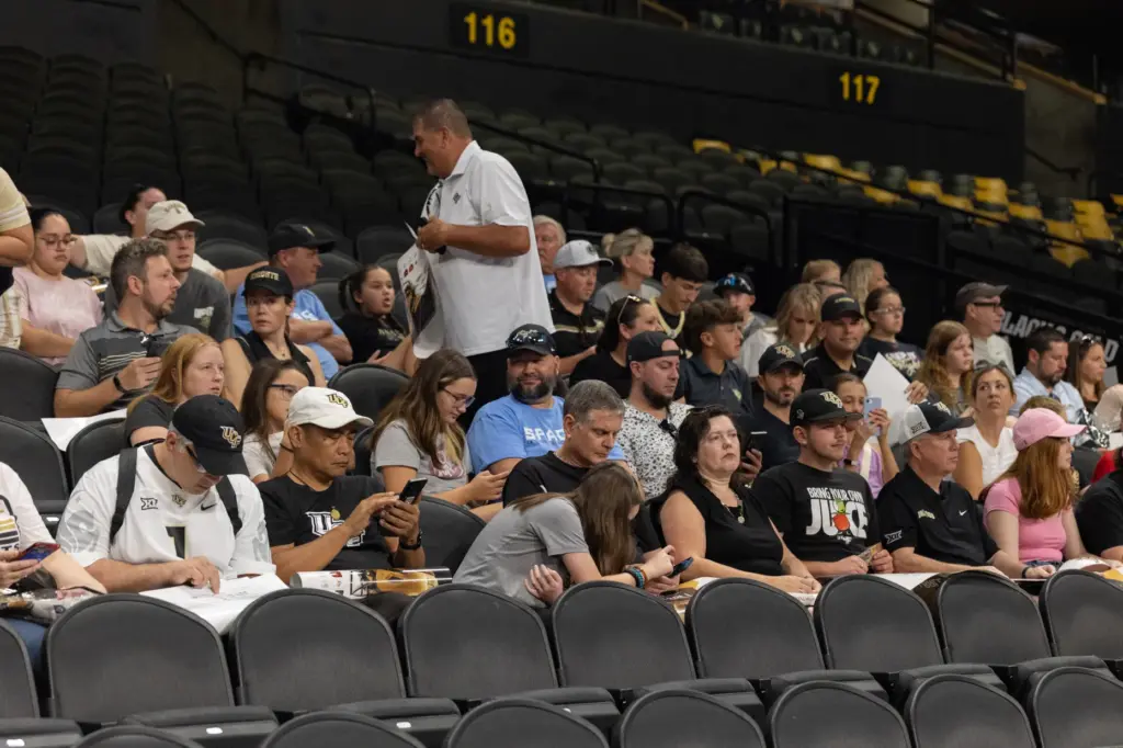 Fans wait to meet Knightâs Football Coach Scott Frost during...