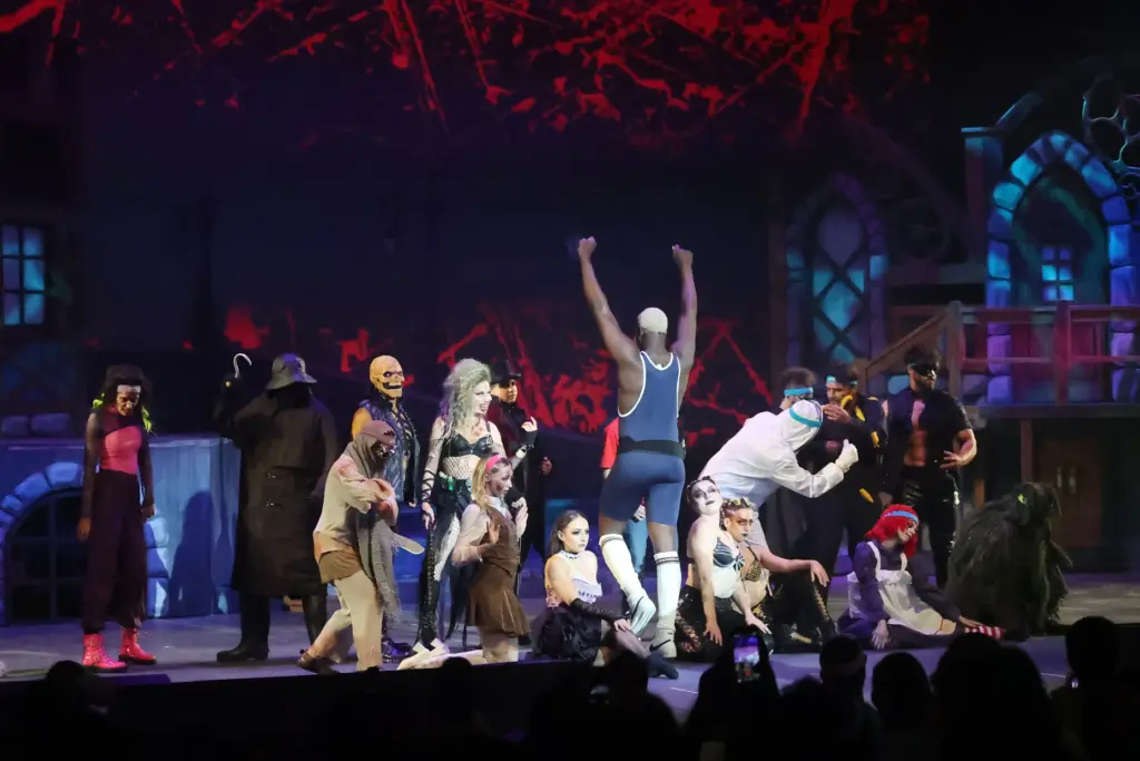 Characters perform on stage during Scream & Sweat, an exclusive...
