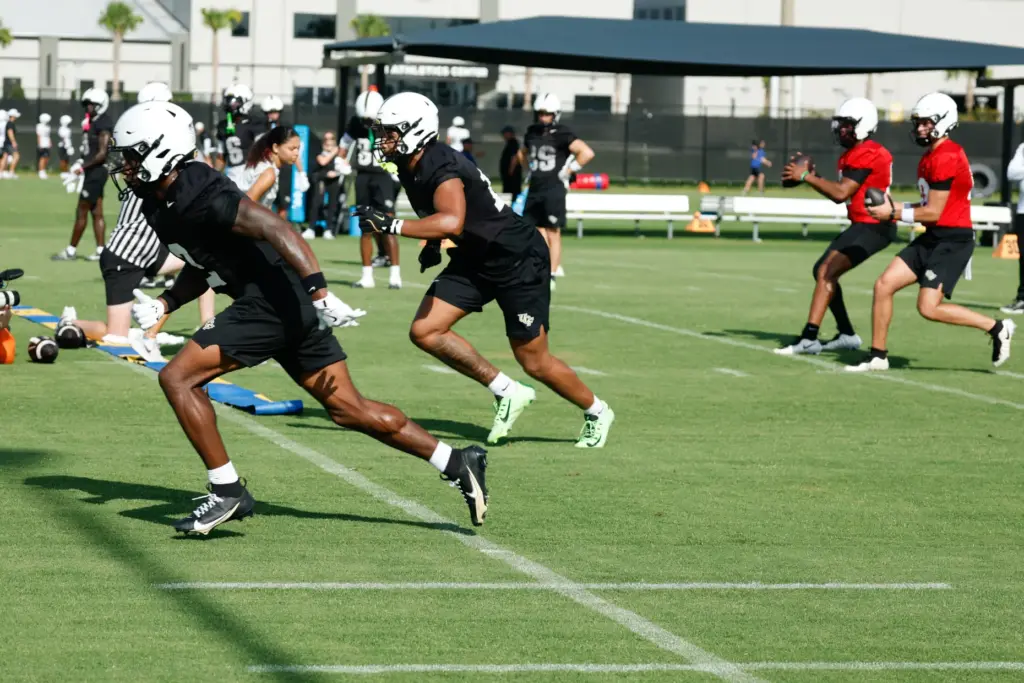 UCF Knights WR Tyren Horned (#2) and TE Caden Piening...