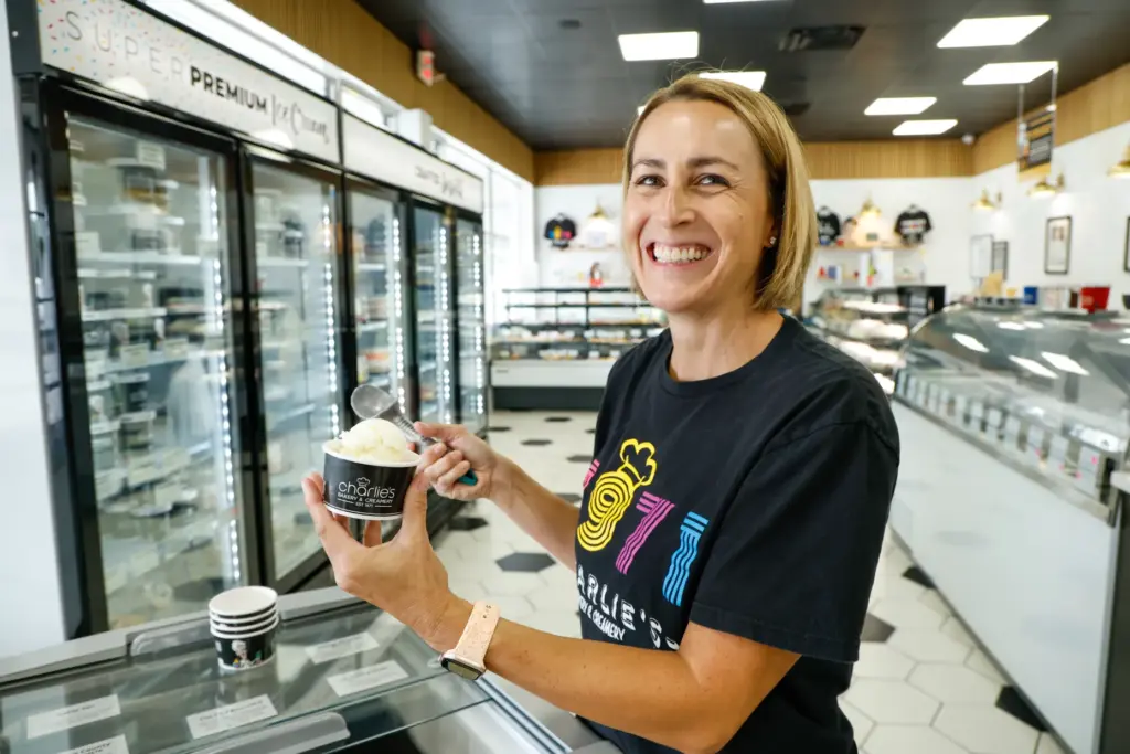 Charlieâs Bakery & Creamery owner Tricia Hage scoops a cup...