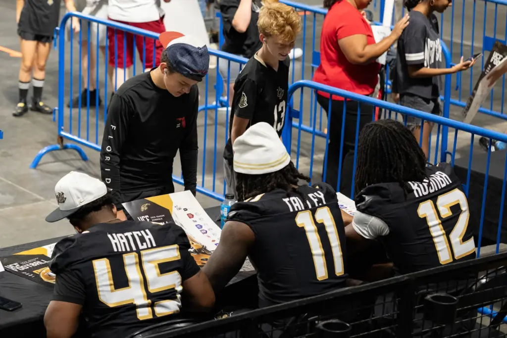 Knightâs Football Players Quentin Hatch, left, Ken Talley, center and...