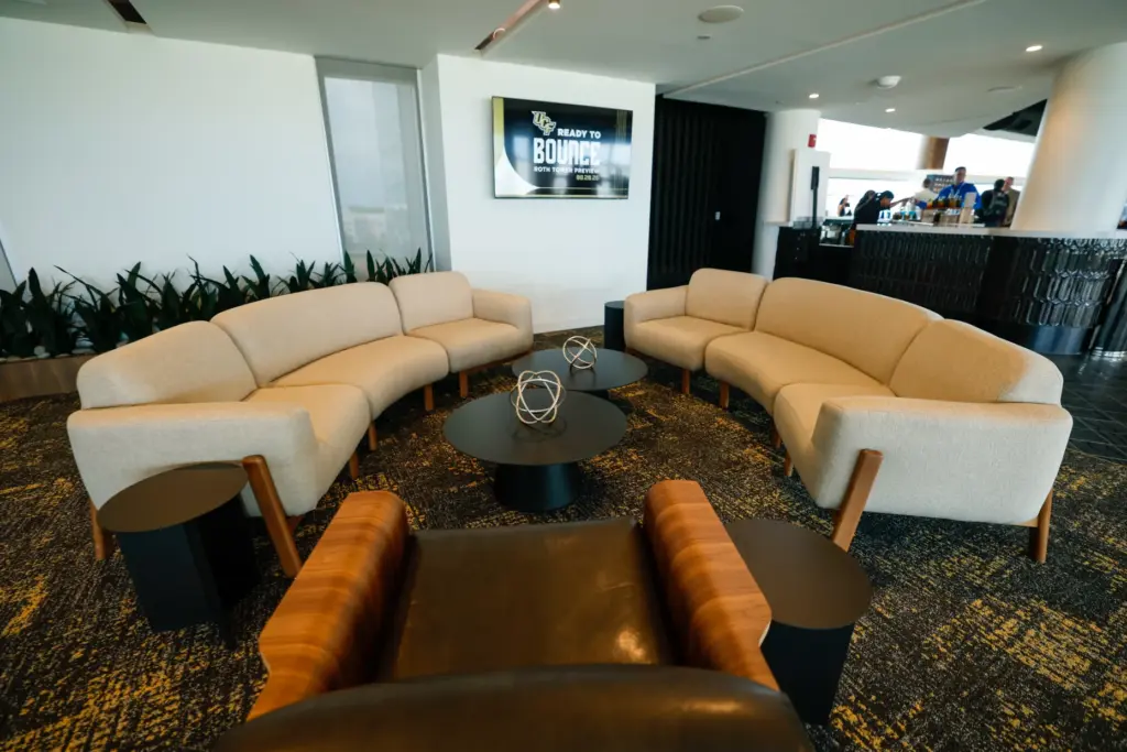 Couches and tables scatter the indoor lounge at the Roth...