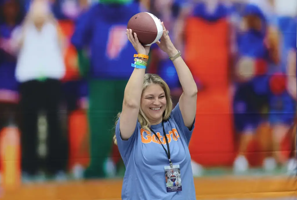 Gator fan Wendy Gowen catches a pass during the Florida...