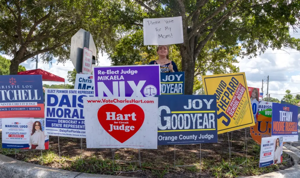 Amid a sea of signs for candidates in the 2026...