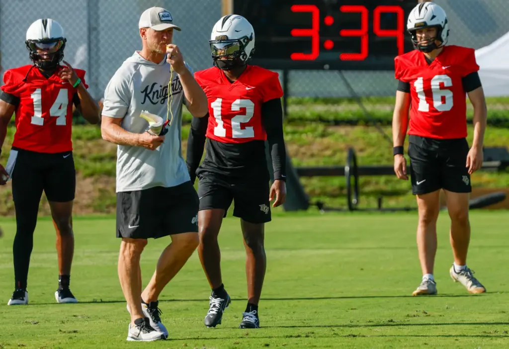 UCF Knights Head Coach Scott Frost oversees drills on the...
