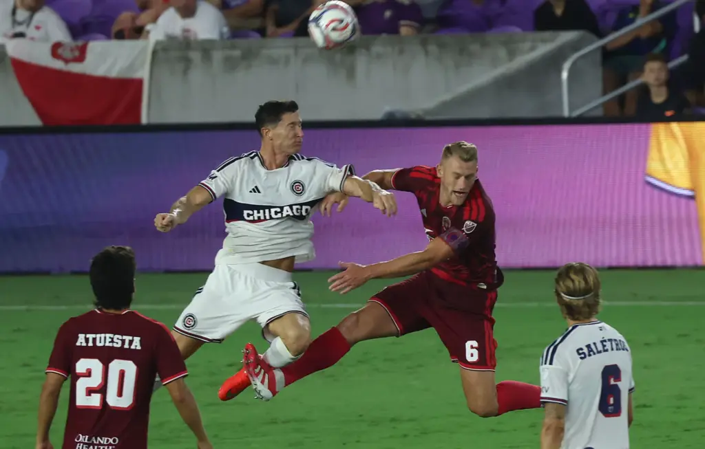 Chicago player Robert Lewandowski (9) and Orlando player Robin Jansson...