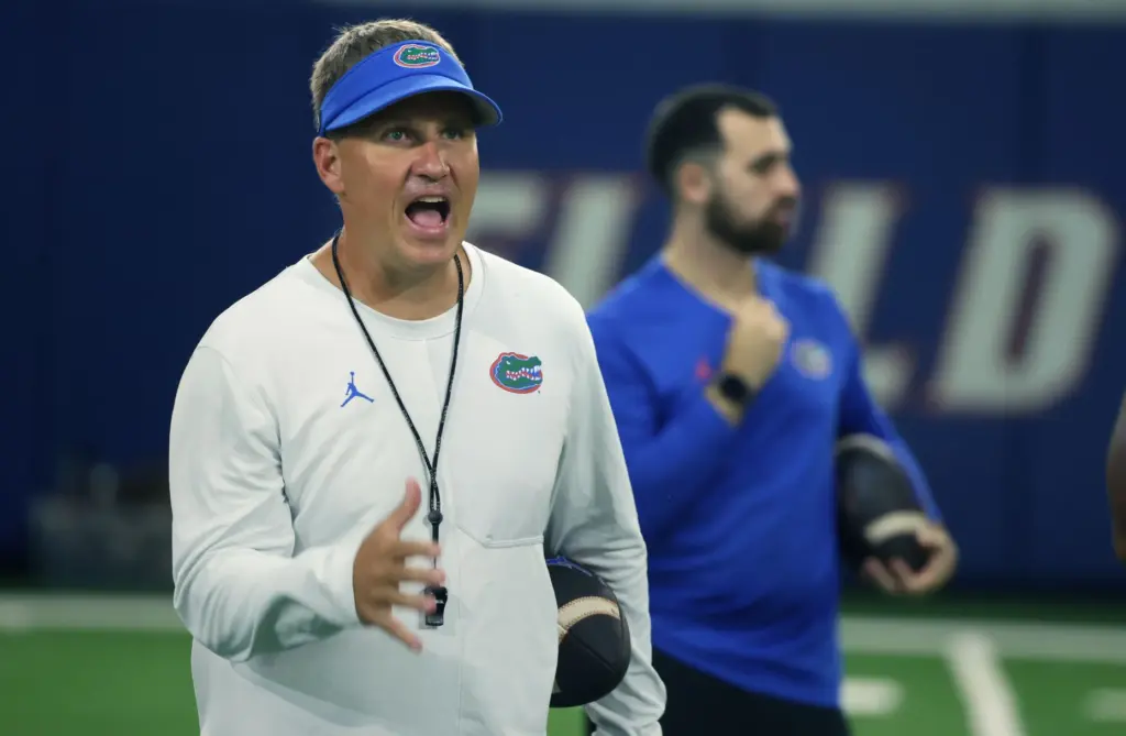 University of Florida offensive coordinator Buster Faulkner gestures during the...