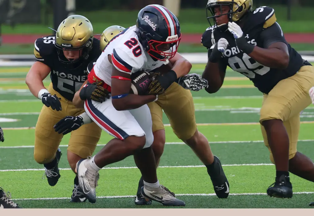 Lake Brantley running back KJ Bradford (20) runs during the...
