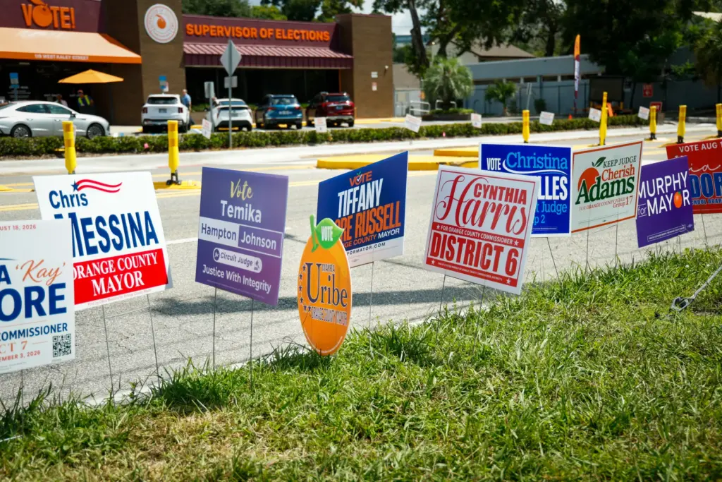 Campaign signs line Kaley Street across from the Orange County...