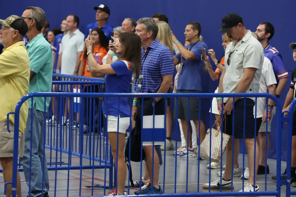Fans wait in line during the Florida Legends Experience at...