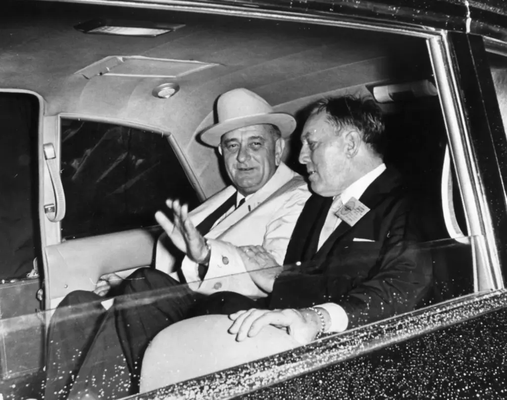 President Lyndon B. Johnson (left) and Orlando Sentinel Publisher Martin...