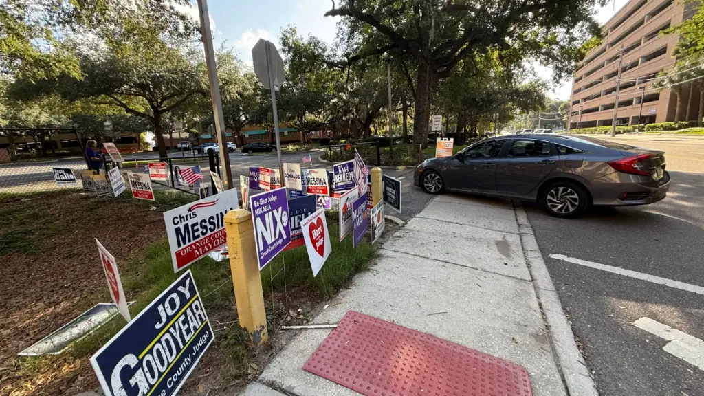 A car enters Precinct 521 at the Marks Street Senior...