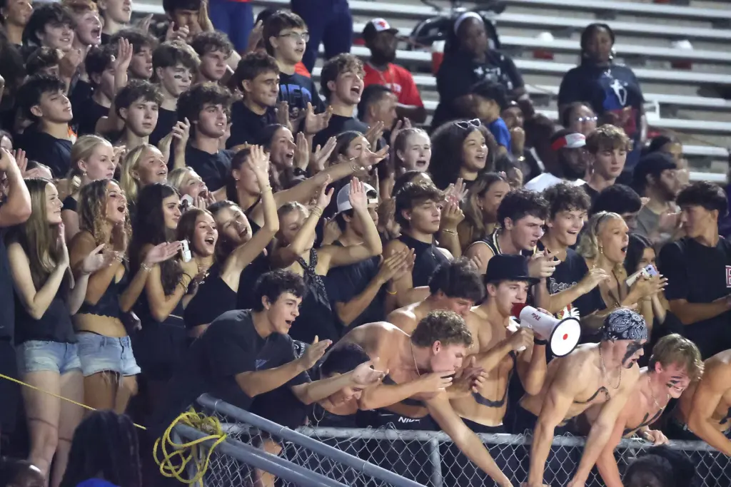 Edgewater students cheer during the The First Academy at Edgewater...